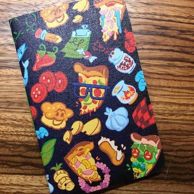 Notebook with Dark Navy Background with Colourful Pizza Cartoons
