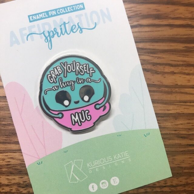 blue and pink enamel pin