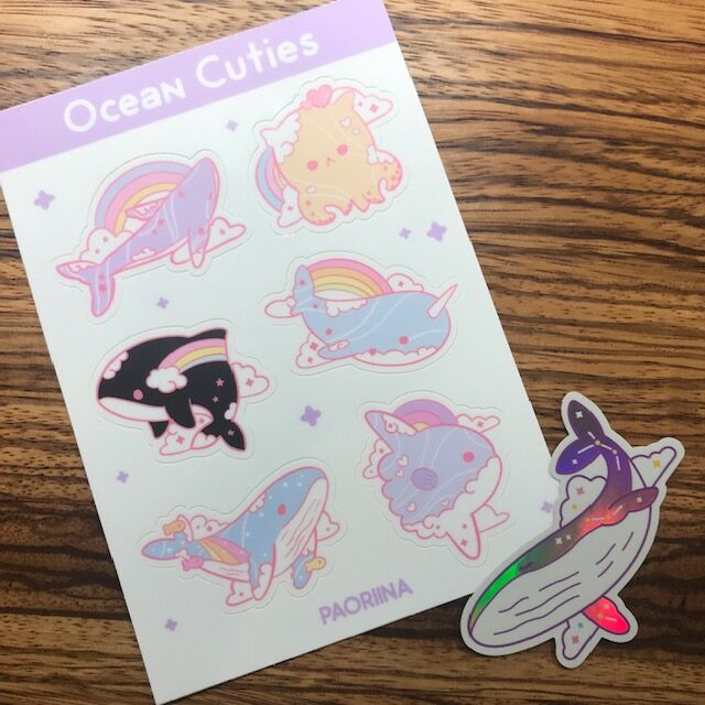 Sticker sheet with 6 stickers on it featuring different fish