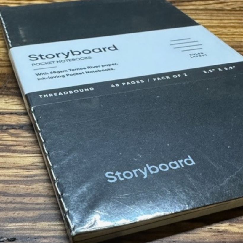 Storyboard Notebook,, notebook with a black cover and the word storyboard in the bottom left cover