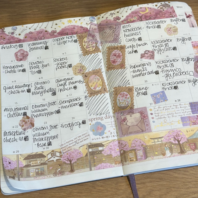 pages of the month of may 2023 in my moleskine planner with washi tape from the Sakura Breeze collection on it.
