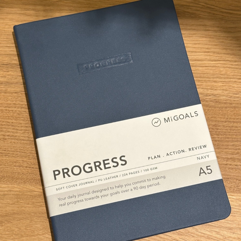 progress journal in navy - cover with belly band still on it.