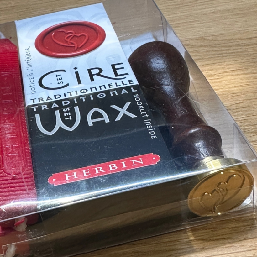 wax seal set from J.Herbin which includes 2 sticks of Kings' wick wax, wooden handle with heart seal.