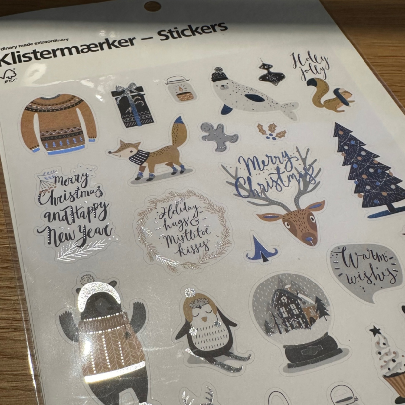 sticker sheet featuring a collection of festive/Christmas stickers images