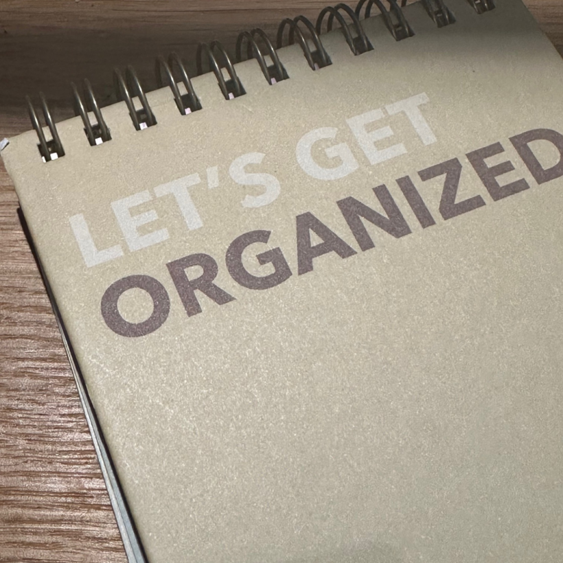 planner pad with let's get organised printed on the front